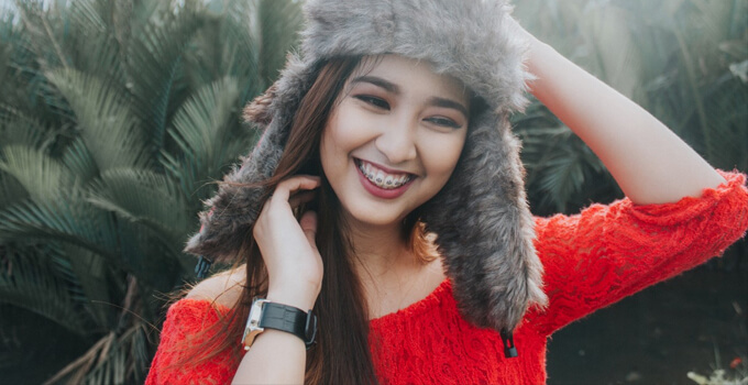 pretty filipina in a fur hat