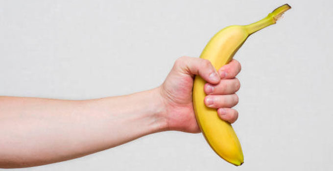holding a banana